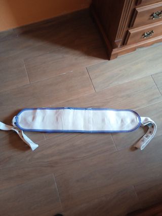 Cinturón de sujeción para cama  con imán. 