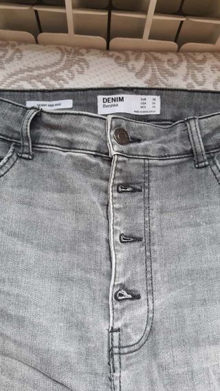 Pantalones skinny grises tiro alto