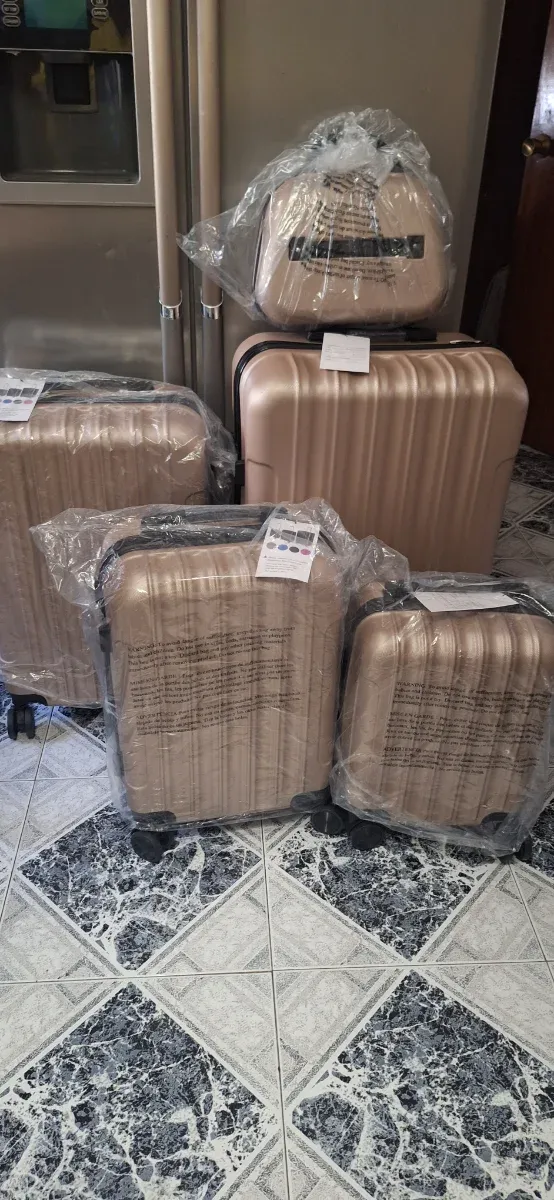 Maletas de viaje 5pzs oro 28,24,20,16,12p