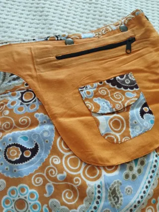 Falda estampada naranja con bolsillo original 