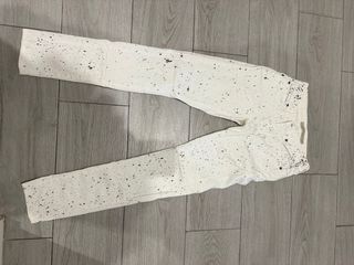 Pantalón blanco salpicado mujer