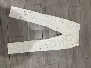 Pantalón blanco salpicado mujer
