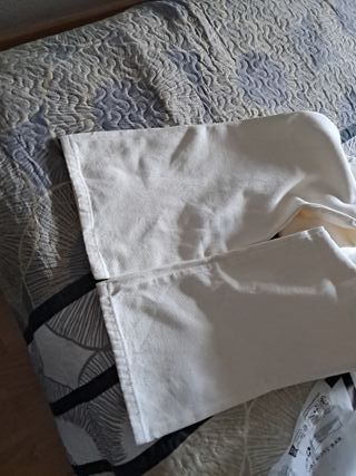 Mono vaquero blanco Zara talla S en la etiqueta 
