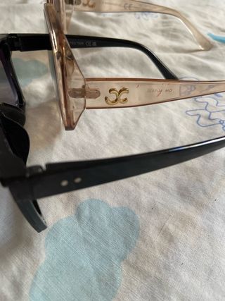 Gafas de sol negras y marrones