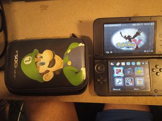 Nintendo 3DS XL + Funda Luigi + Juegos