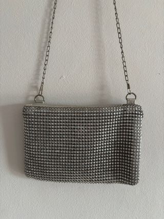 Bolso de mano con brillos plateado