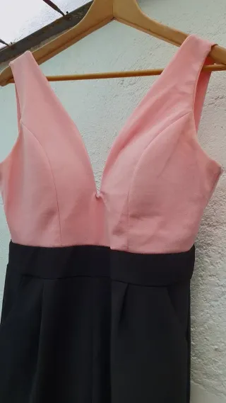 Mono elegante fiesta negro y rosa