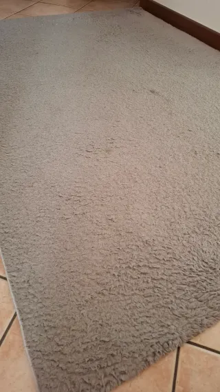 Tappeto beige in tessuto