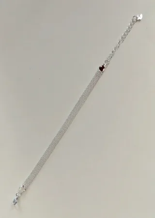 Pulsera plateada.