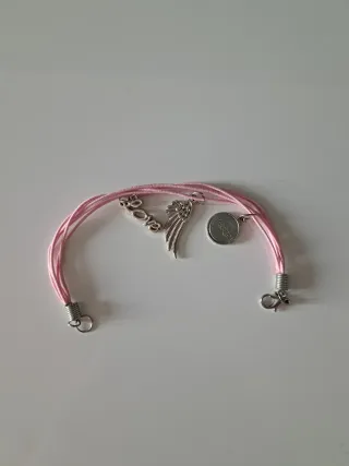 Braccialetto cordino rosa charms argento