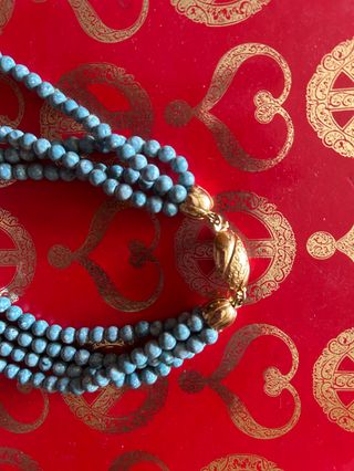 Collane vintage blu e oro