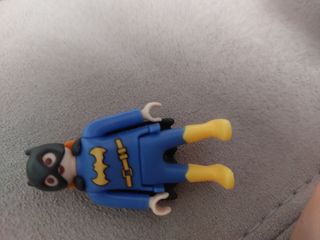 Playmobil niño naranja y verde