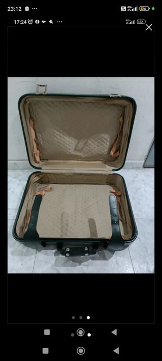 Maleta verde de viaje