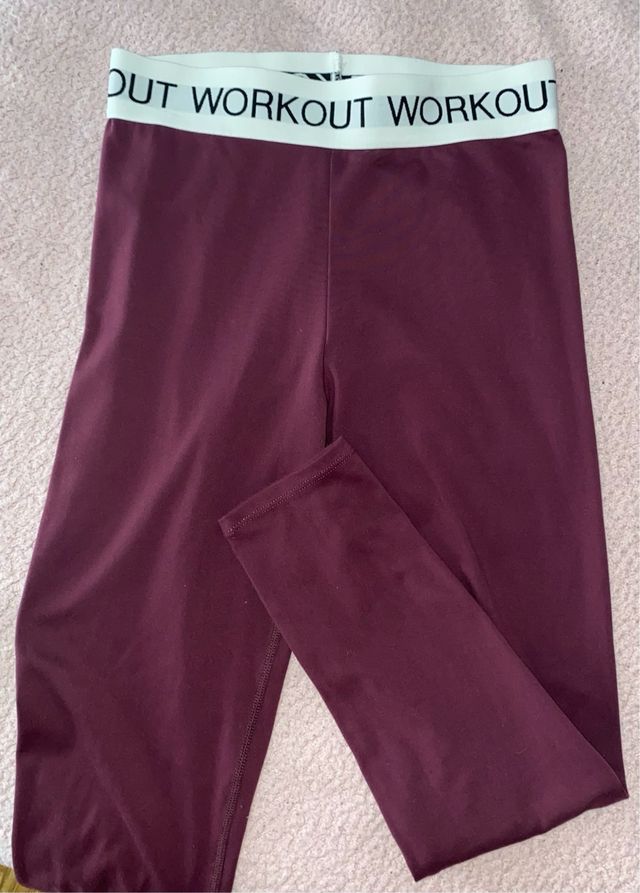 Leggings morados con banda blanca