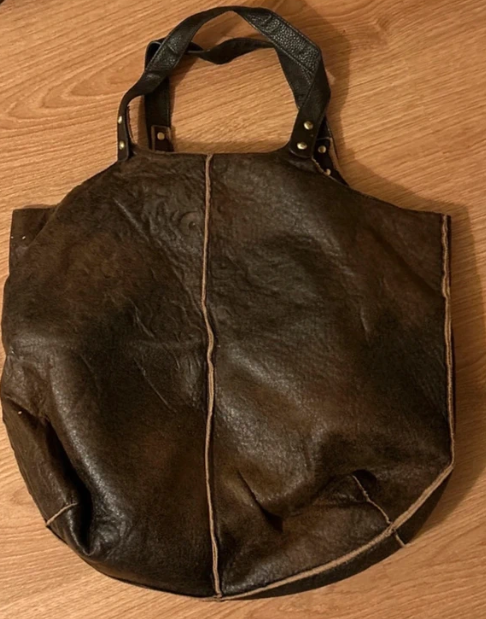 Mala castanha de mão nunca usada