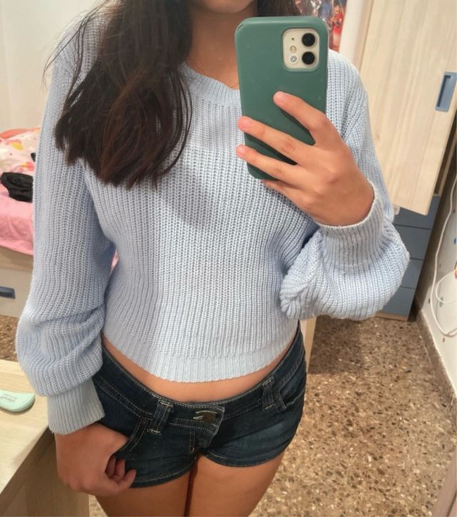 Sudadera azul de punto espalda abierta