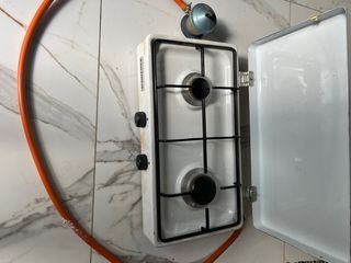 Pequeña cocina de gas butano
Marca ( Corberó)