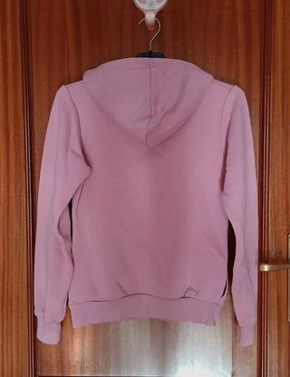 Sudadera rosa con carita feliz y texto
