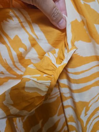 Vestido playero naranja y blanco manga larga