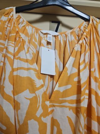 Vestido playero naranja y blanco manga larga