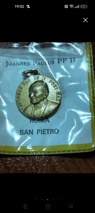 9 medagliette religiose più 1 crocifisso vintage.