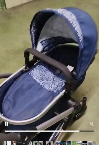 Cochecito de muñecas azul