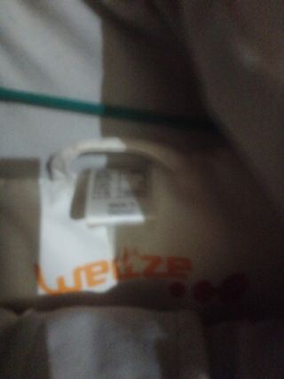 Cazadora Wenze blanca y naranja