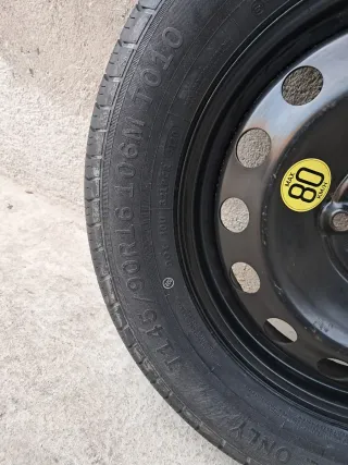 Rueda de repuesto tipo galleta para BMW