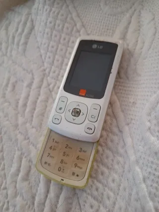 Telefono cellulare LG KU380 bianco e giallo