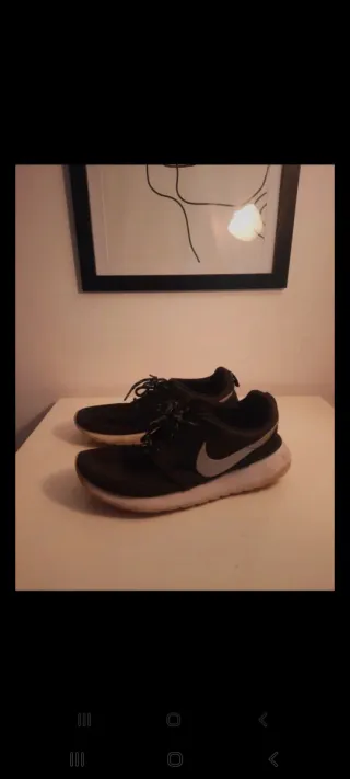 Zapatillas deportivas Nike negras y blancas