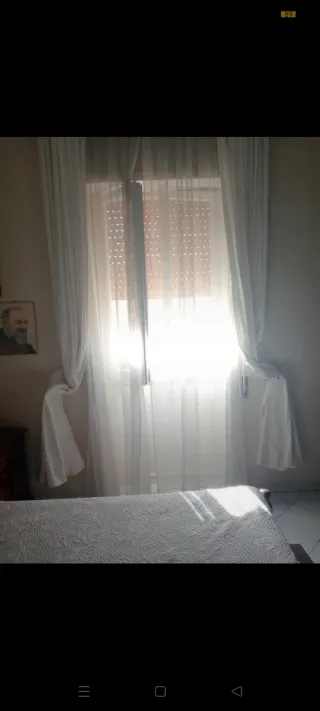 Tende artigianali bianche in tessuto
