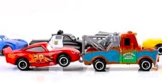 CARS de Disney caja 6 coches + Muñeco Spiderman 