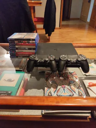 PS4 Slim 1TB Negra + 2 Mandos+10 juegos