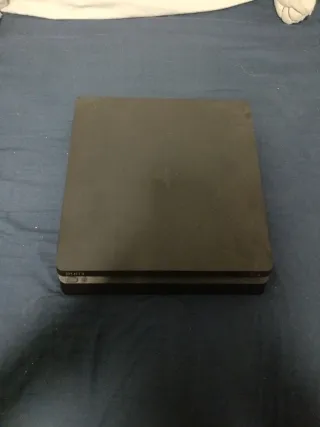 PS4 Slim Sony Negra con más cosas