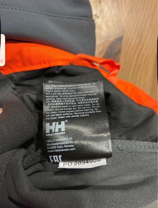Chaqueta Helly Hansen gris y naranja. Hombre