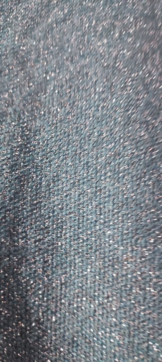 Jersey azul petróleo con brillo plateado, ámplio.