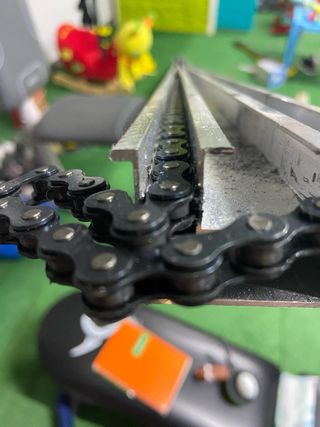 Carril cadena puerta seccional