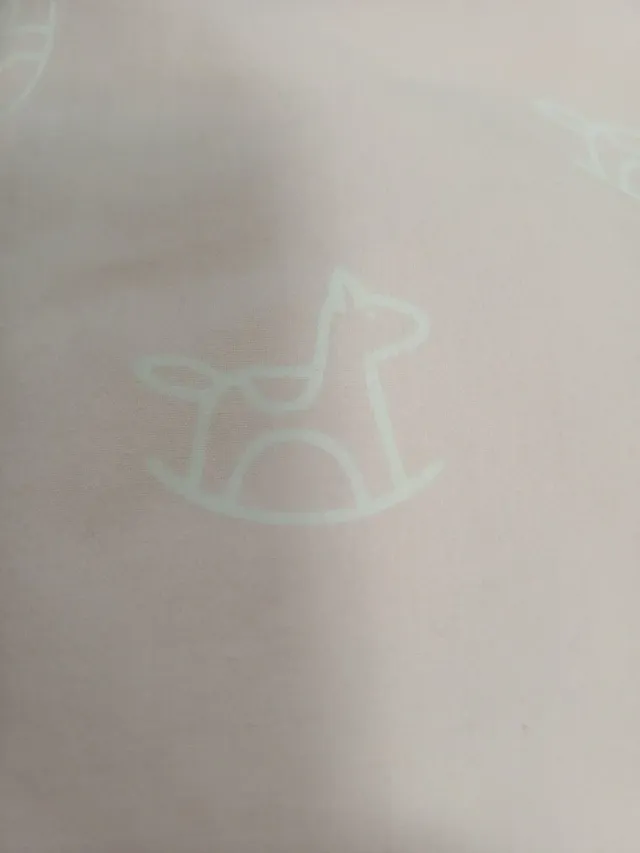 Cojín de lactancia rosa