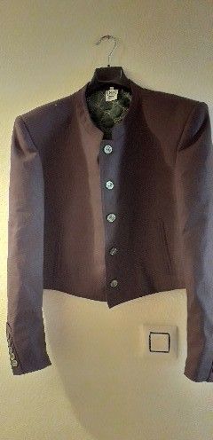 Traje campero marrón puesto una vez