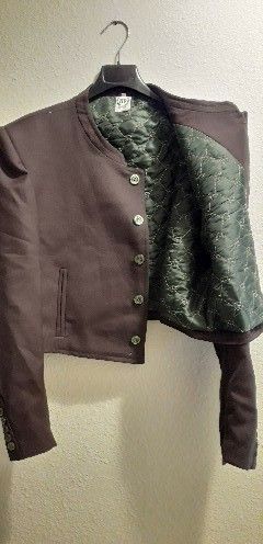 Traje campero marrón puesto una vez