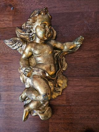 Ángeles de resina dorado 50 euros la pareja