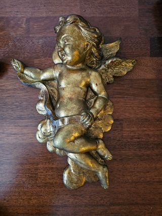 Ángeles de resina dorado 50 euros la pareja