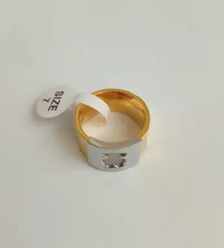 Anillo acero bicolor.
