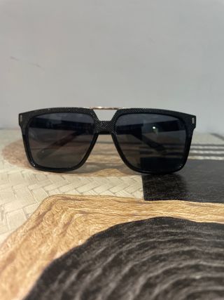 Gafas de sol hombre negras y doradas