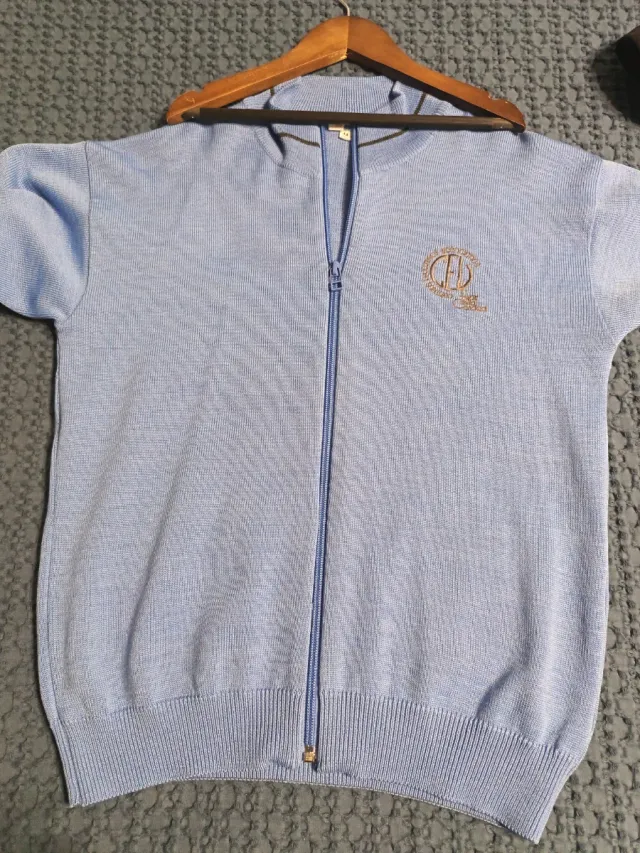 Chaqueta de uniforme con cremallera
Talla 14