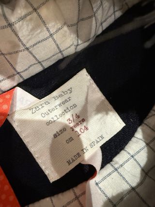 Parka niña Zara negra con capucha rosa
