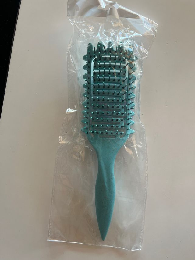 Cepillo para pelo rizado color azul verdoso