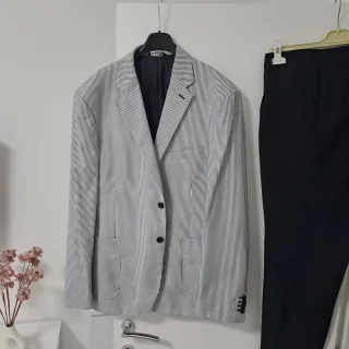 Completo uomo tg.56 righe bianco e nero.