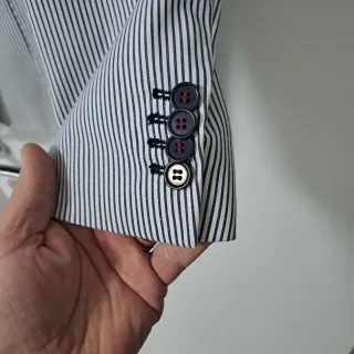 Completo uomo tg.56 righe bianco e nero.