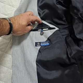 Completo uomo tg.56 righe bianco e nero.